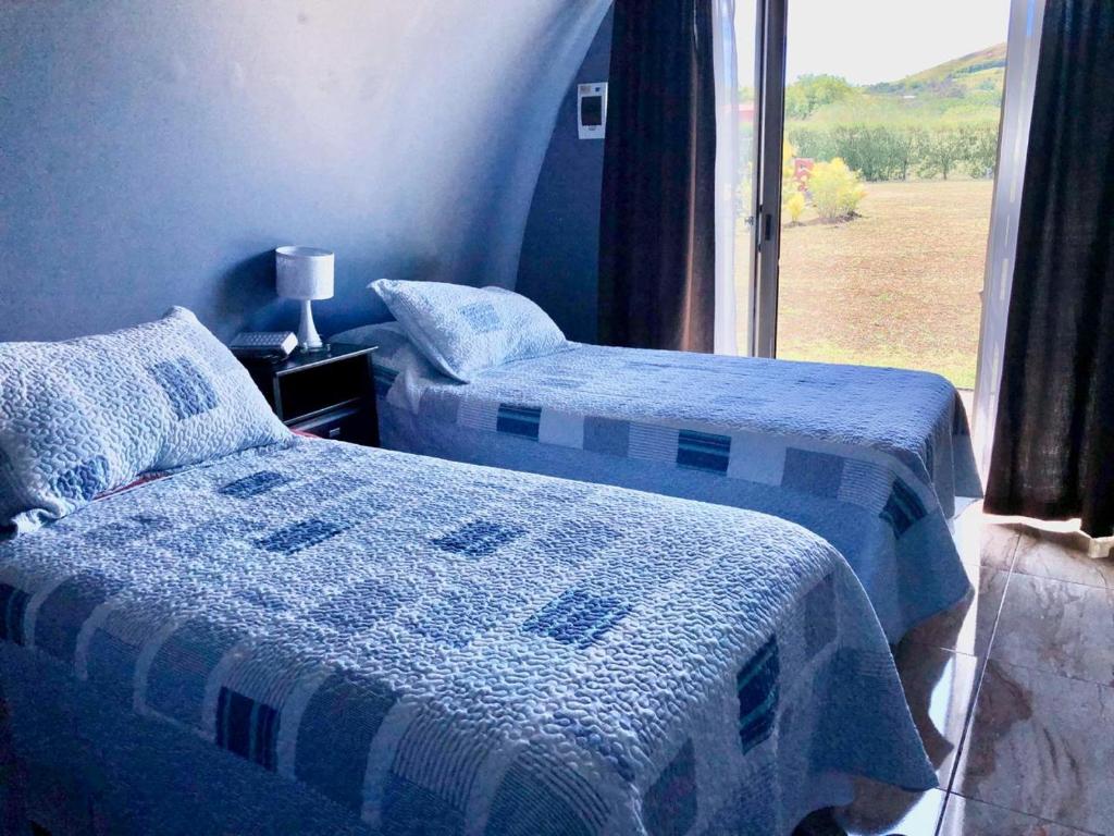 Habitación Moana · cama doble con ventanal al Pacífico (1/1)